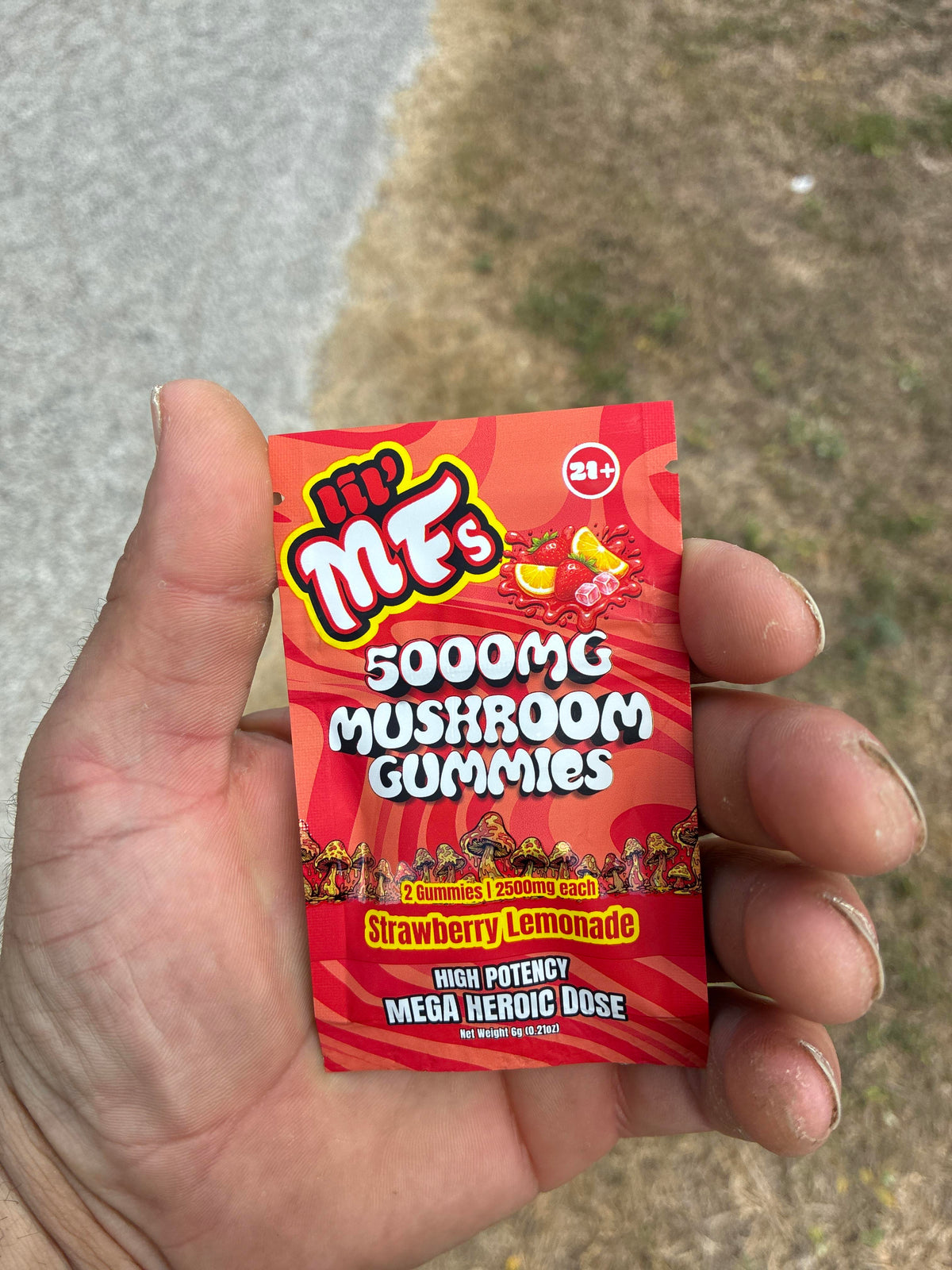 Two boxes of M&Ms Mushroom Gummies with strawberry lemonade flavor on a white background.